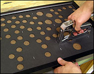 Picture showing how to staple the foamcore to the hardboard.